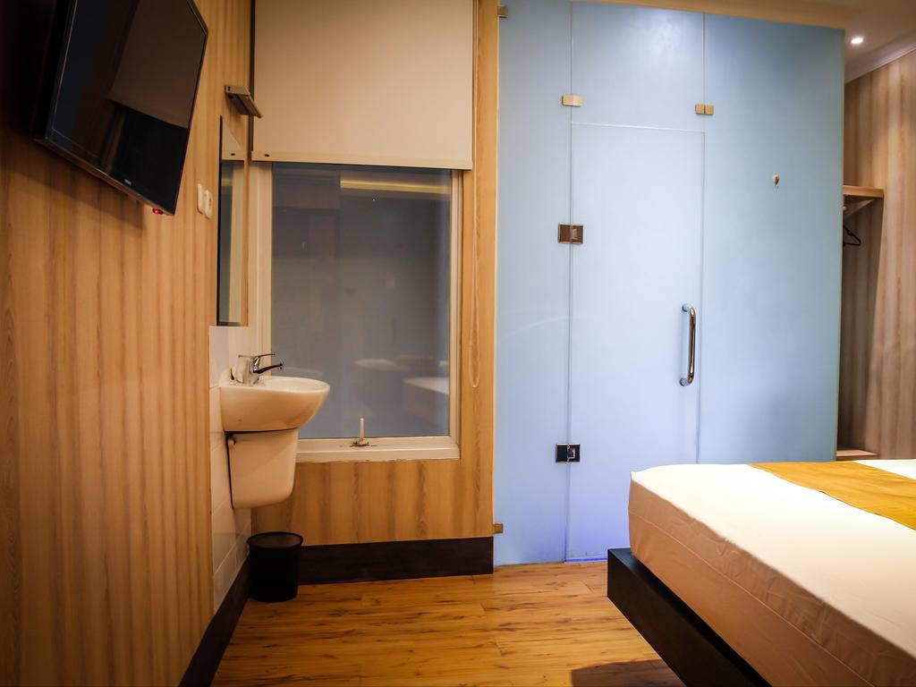 Madu Inn Jacarta Quarto foto